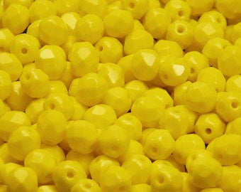 Opaque Yellow Faceted 6mm